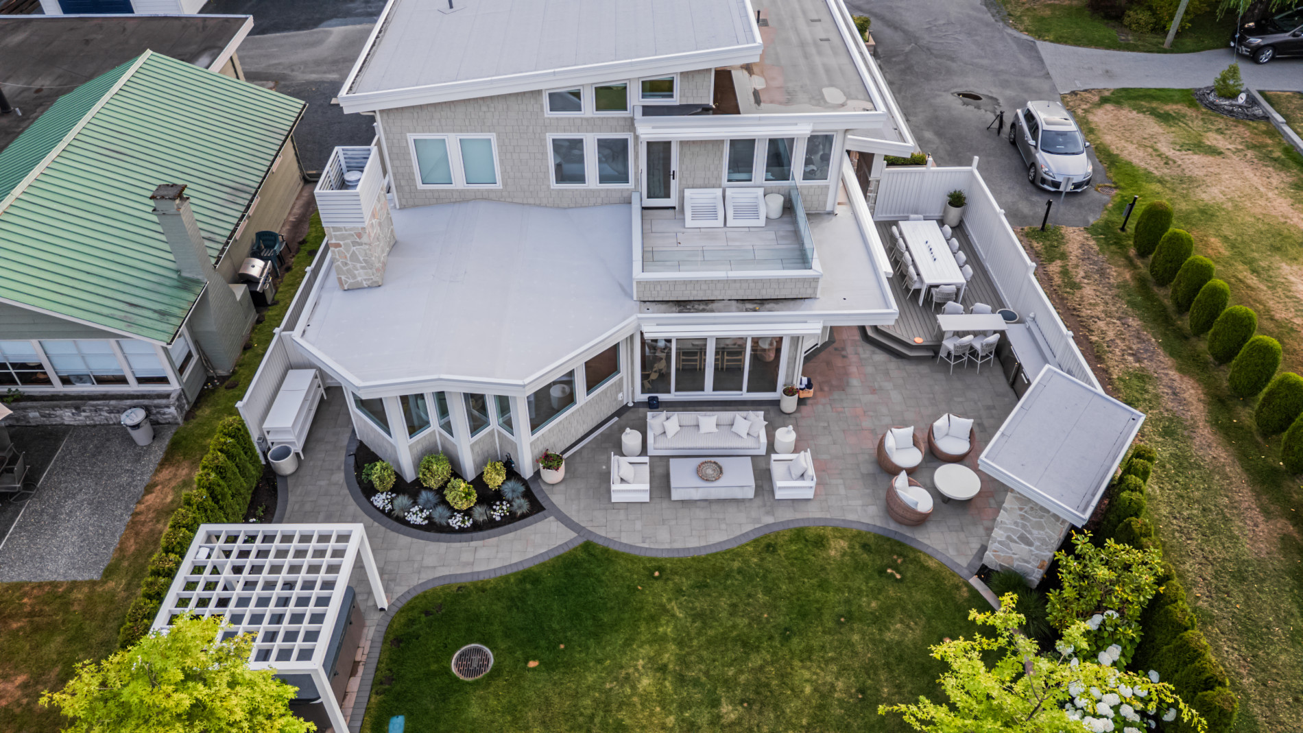 view of outdoor living space at lakeside home