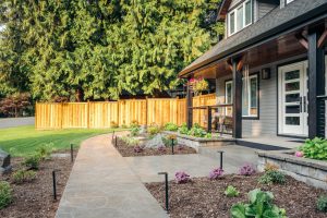front entrance landscaping with pathways, gardens and landscape lighting